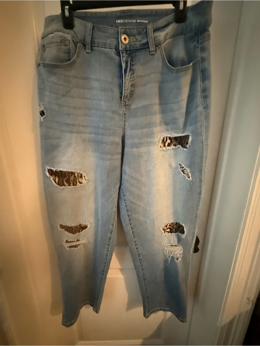 INC Denim Light Blue Distressed Women’s Jeans with leopard patches. Size 16
